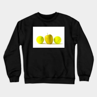 Yellow apple between tennis balls Crewneck Sweatshirt